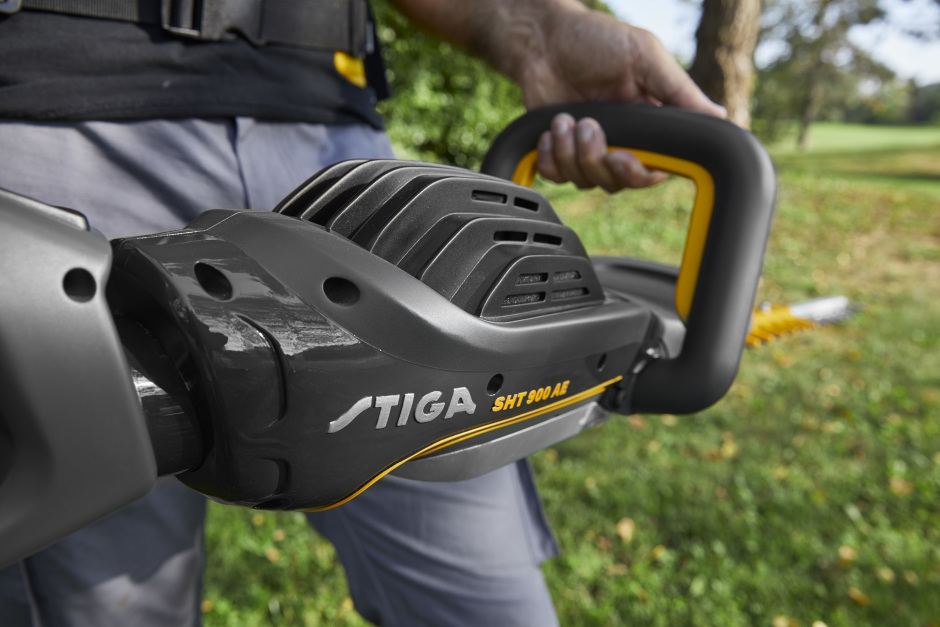 Stiga SHT 900 AE 48v Cordless Hedgetrimmer - In Use - Rear-Right View.