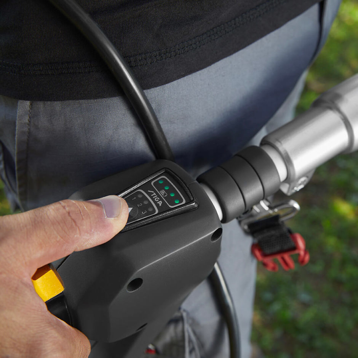 Stiga SPH 900 AE 48v Cordless Long-Reach Hedgetrimmer - In Use Showing Digital Keypad Control - Close-Up View.
