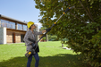 Stiga PS 700e 48v Cordless Pole-Pruner - In Use Pruning High Branches at Circa 45°