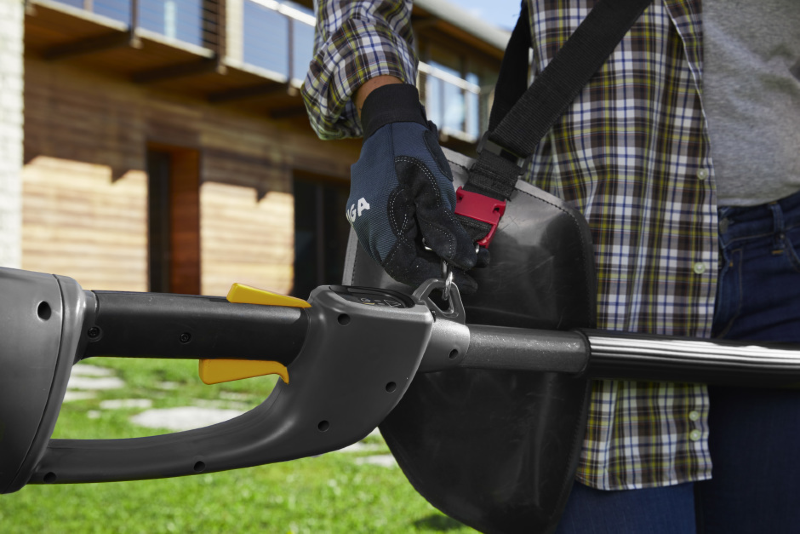 Stiga PS 700e 48v Cordless Pole-Pruner - Harness Attachment Point and Dual Activation-Triggers.