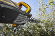 Stiga HT 700e 48v Cordless Hedgetrimmer - In Use - Right-Rear Underside View.