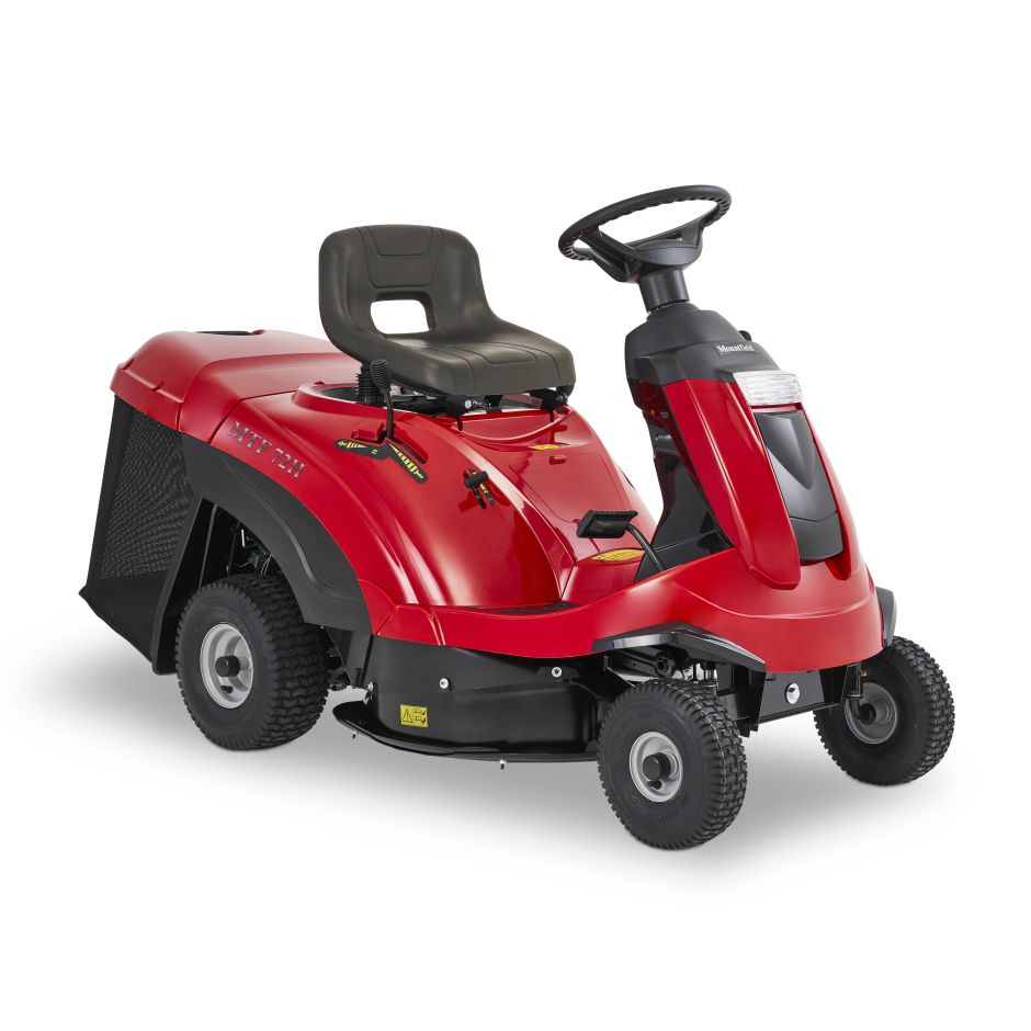 A ride-on mower with a seat and a steering wheel.